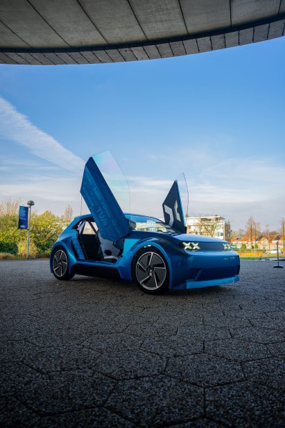 Blue car with scissor doors
