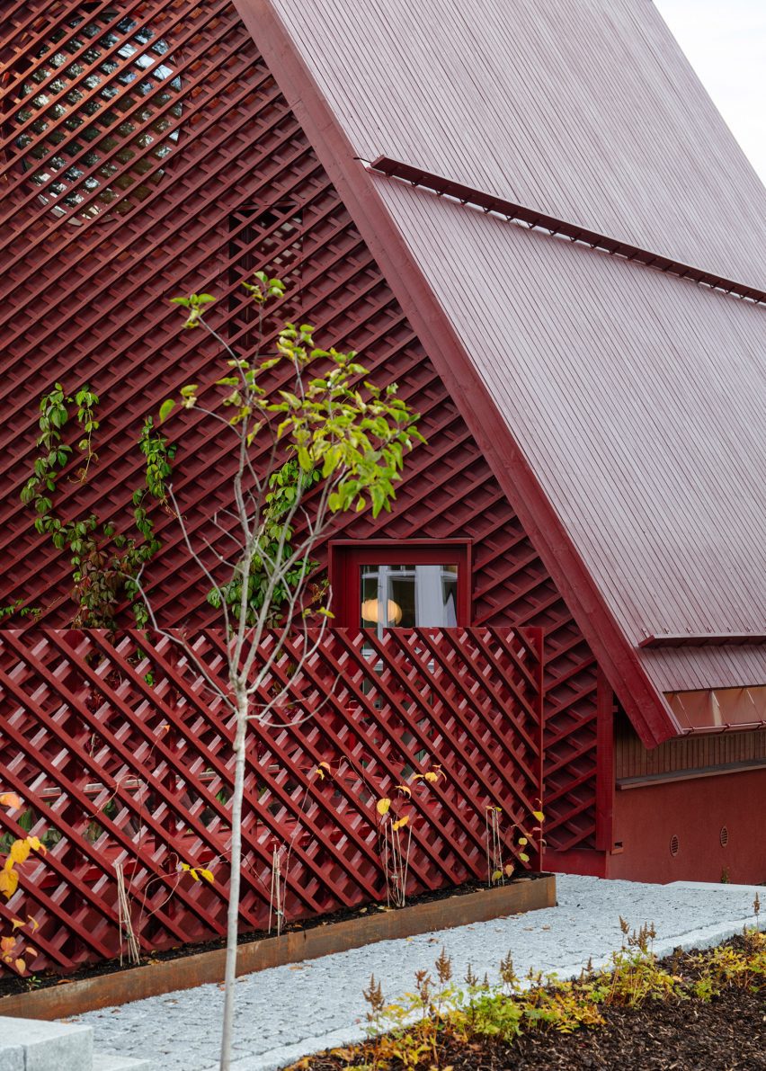 House extension with red latticework