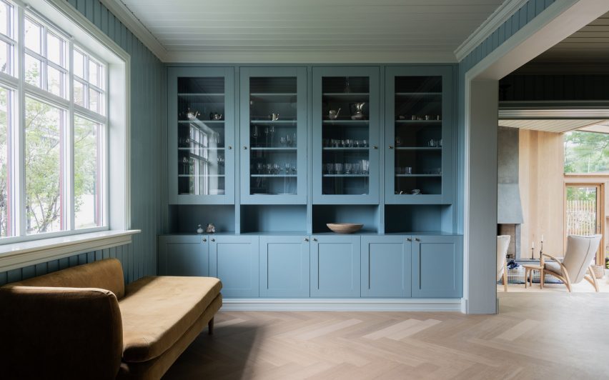 Blue-painted built-in cupboards