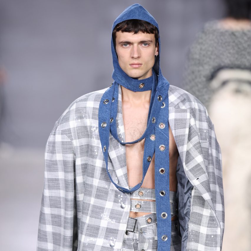 photo of model walking a runway