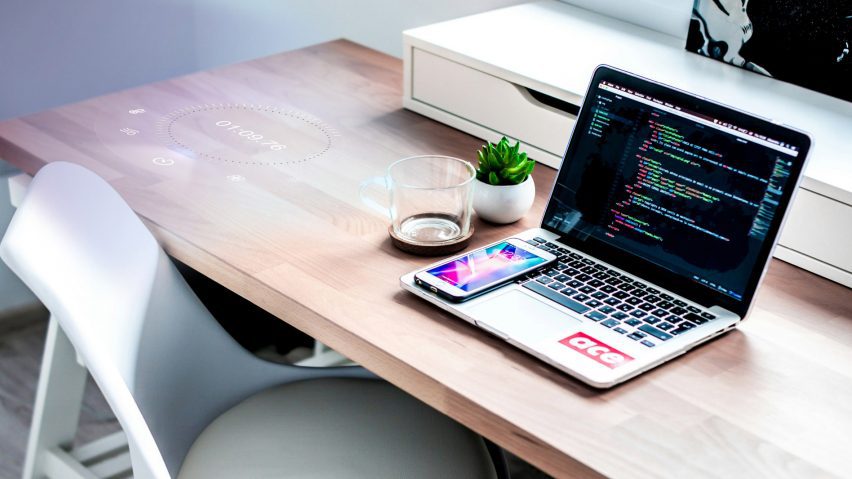 image of laptop and phone on desk