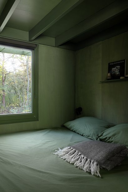 Bedroom interior at holiday home by i29 Architects