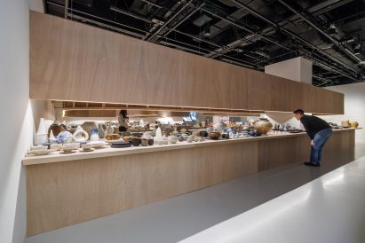 Man looking at craft at Japan House London