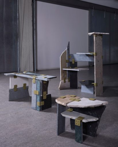Remi Reniers uses steel clamps to connect stone offcuts