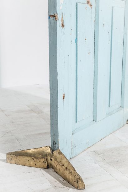 Door with brass feet by Alexandre Henry