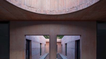 View through to swimming pool in Lima House by Pezo von Ellrichshausen