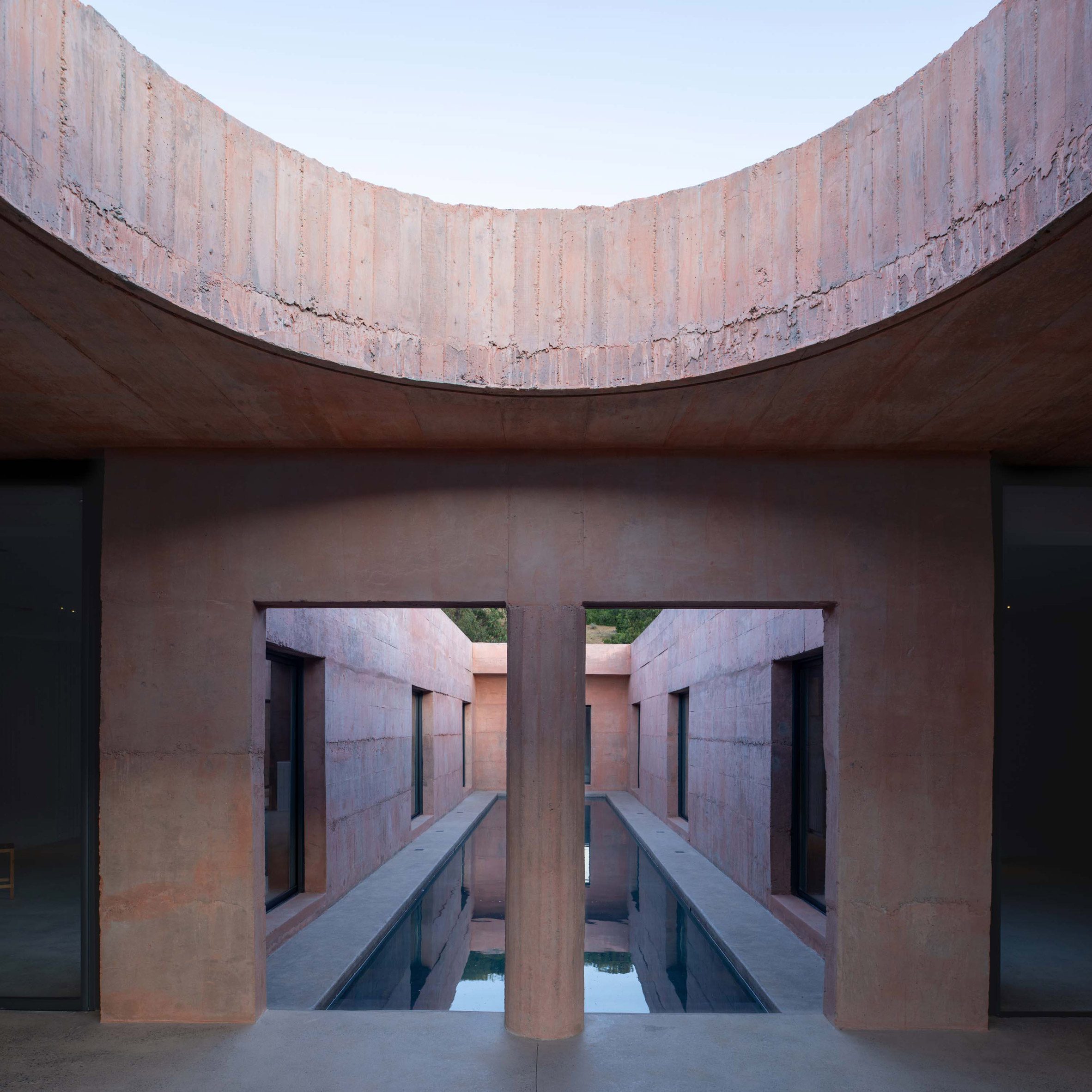 Pezo von Ellrichshausen organises pink concrete Lima House around pool