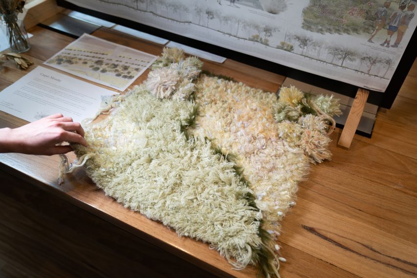 a photograph of a a fabric on a wooden surface