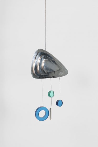 a hanging mobile in tones of silver and blue