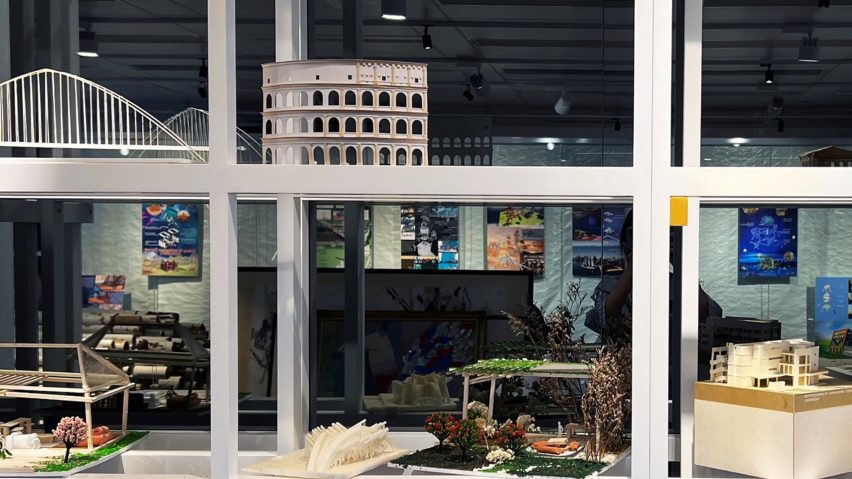 an image of architectural models on a shelf
