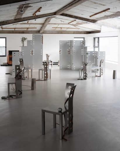 Seoul gallery filled with metal furniture