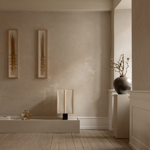 Vase in window in beige room