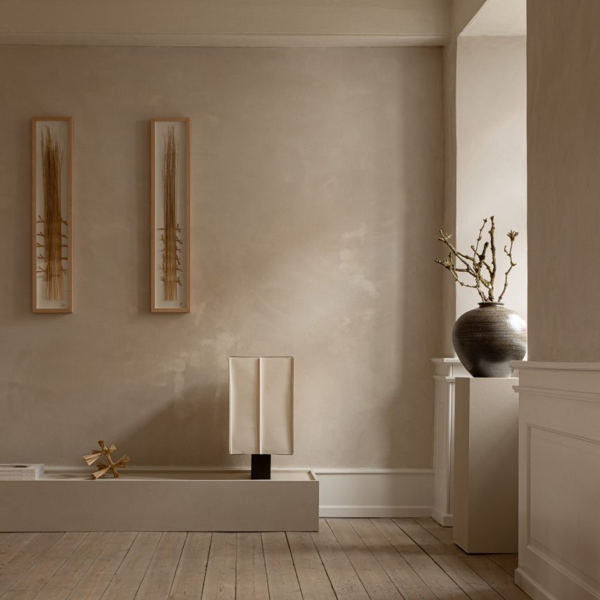 Vase in window in beige room