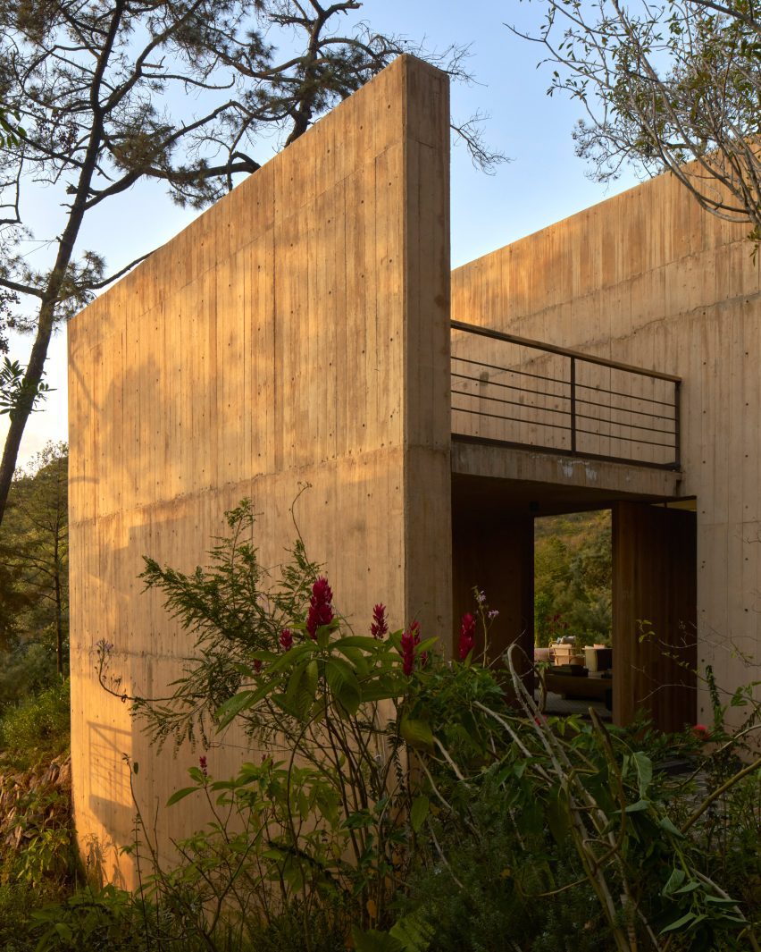 Concrete wall at Birds-eye view of Rancho del Bosque house in Valle de Bravo by Sordo Madaleno