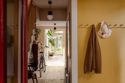 Hallway leading through A Simple Addition by OEB Architects