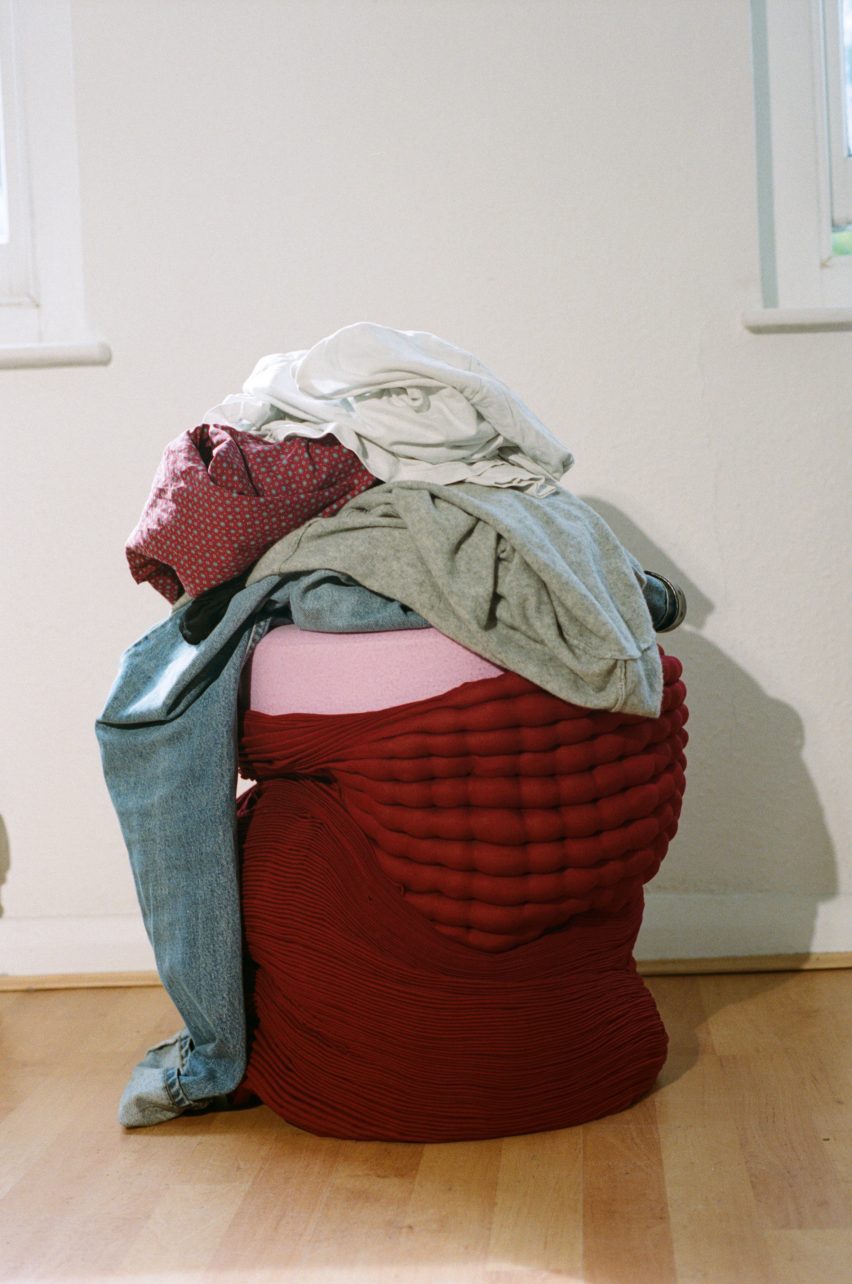 Smock stool by Tessa Silva in red with fabric on top