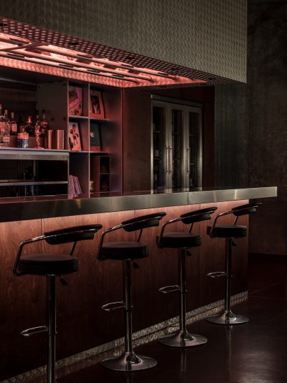 Metal bar with bar stools
