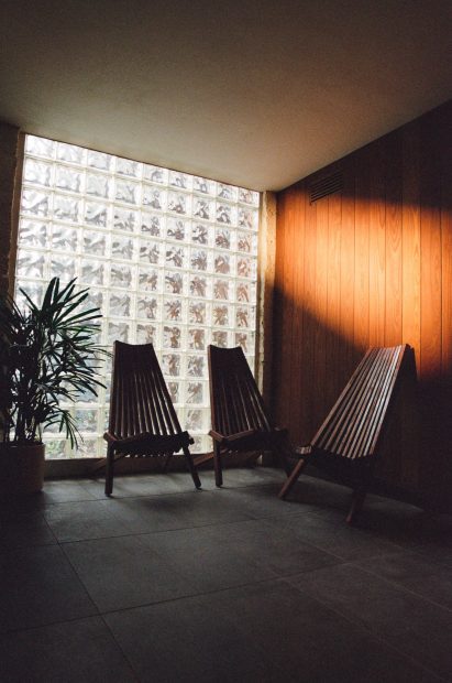 Seating area against a glass block wall