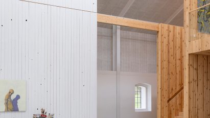 Sliding walls in Michael Kvium's studio, a historic barn restored by architect Martin Schack