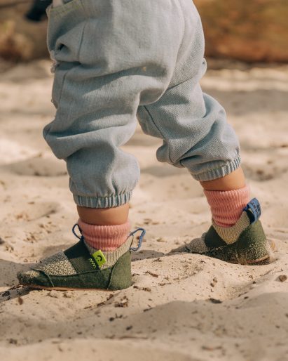 Child wearing Brightland Rise shoes