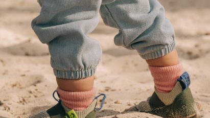 Child wearing Brightland Rise shoes