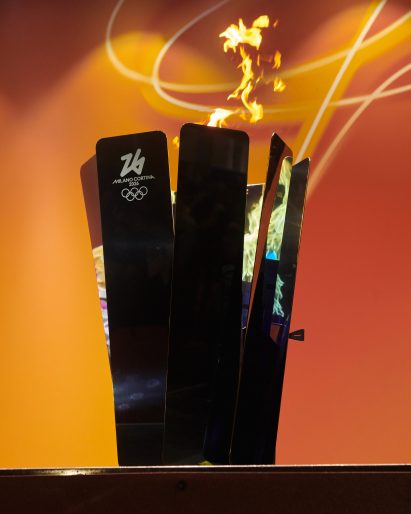 Steel Olympic cauldron with orange fire