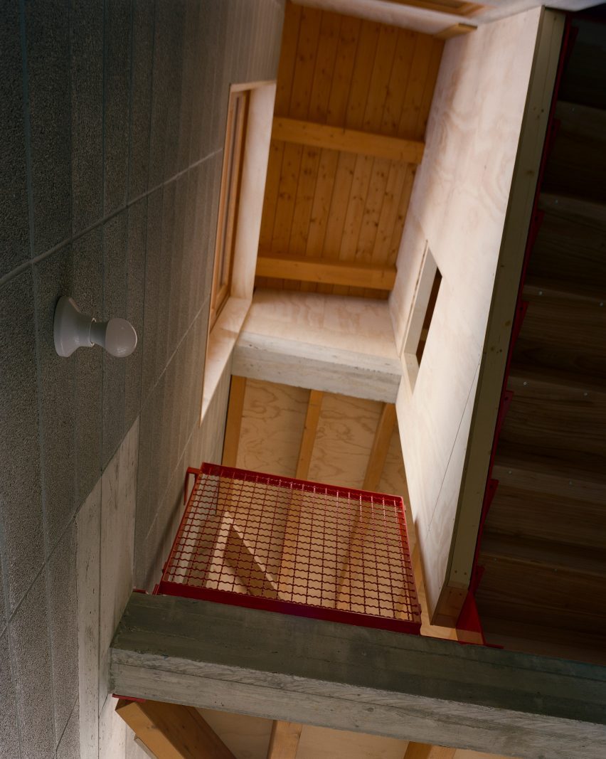 Red balustrade in Casa BM by Errant Architetture