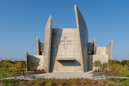 Curving concrete chapel