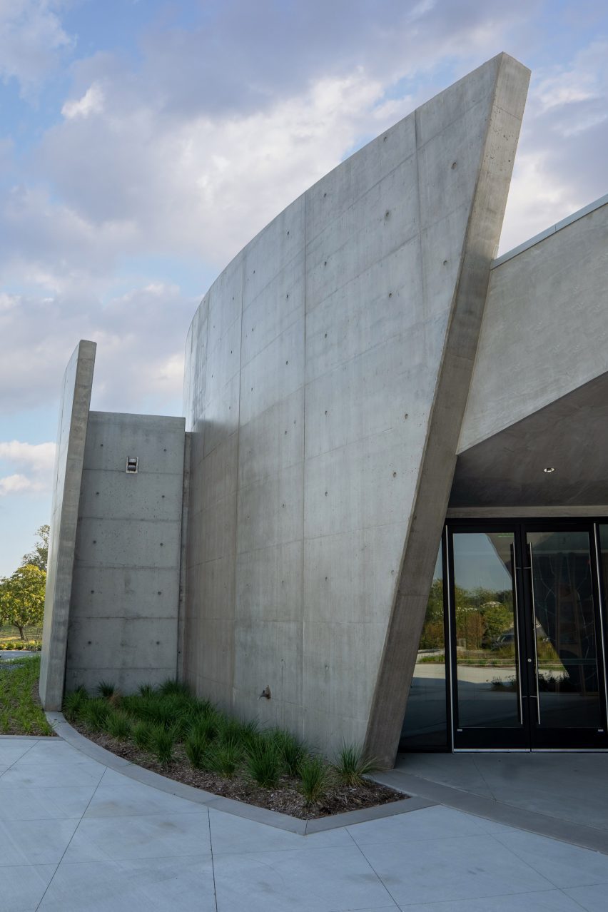 Curving concrete chapel