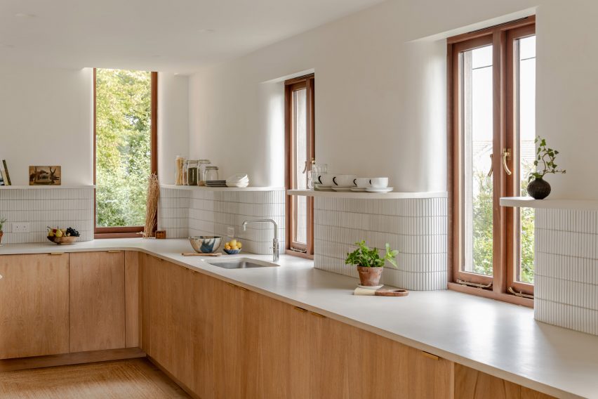 Kitchen with curved window recesses in Clay Rise by Templeton Ford