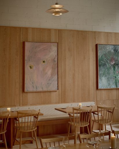 dining area with large colourful paintings