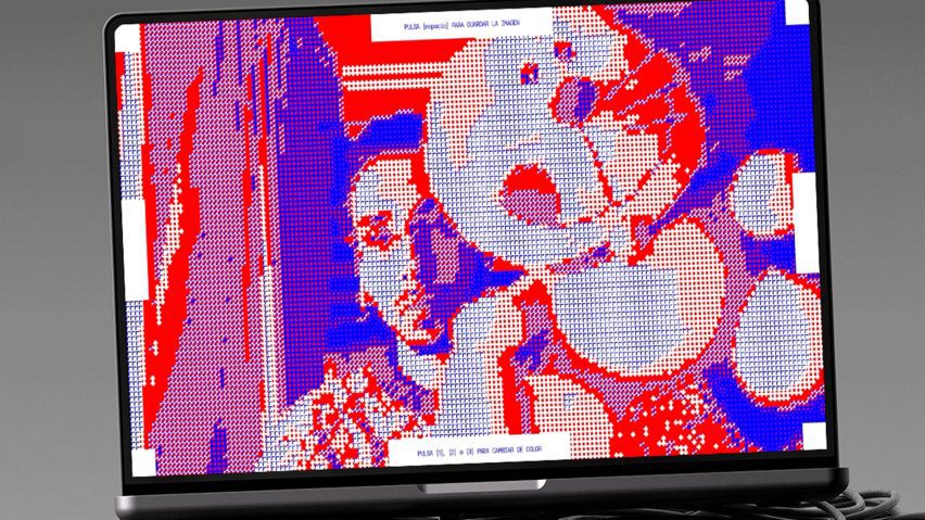 a laptop screen showing a pixelated image in tones of purple, pink and red