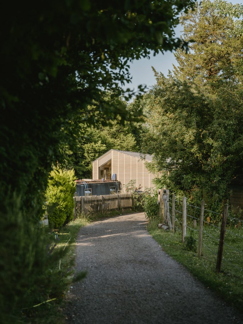 Approach view of Float House by TiggColl