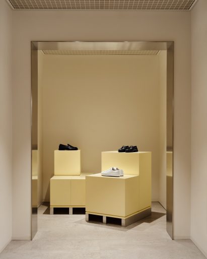 Pale yellow footwear displays