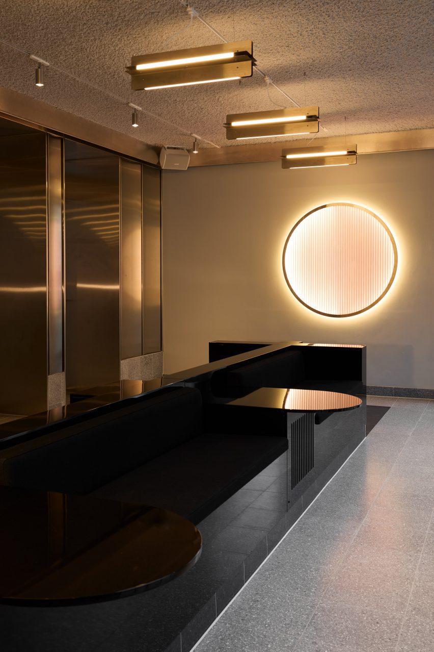 Circular light in front of black table