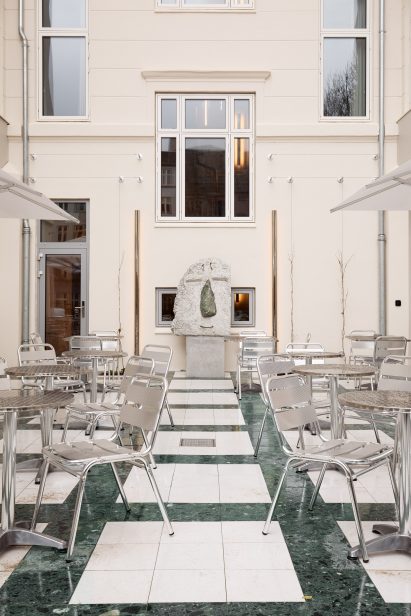 Courtyard with sculpture of smiling face