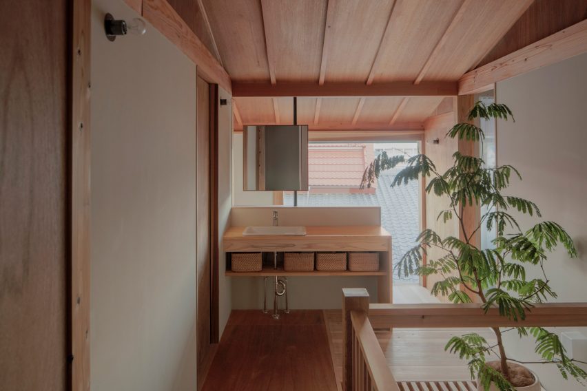 Home with white walls and wooden floor