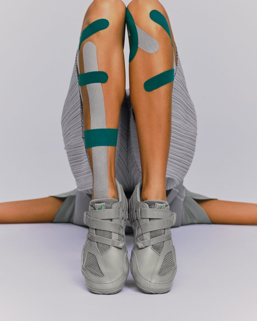 Silvery trainers on person in silver outfit