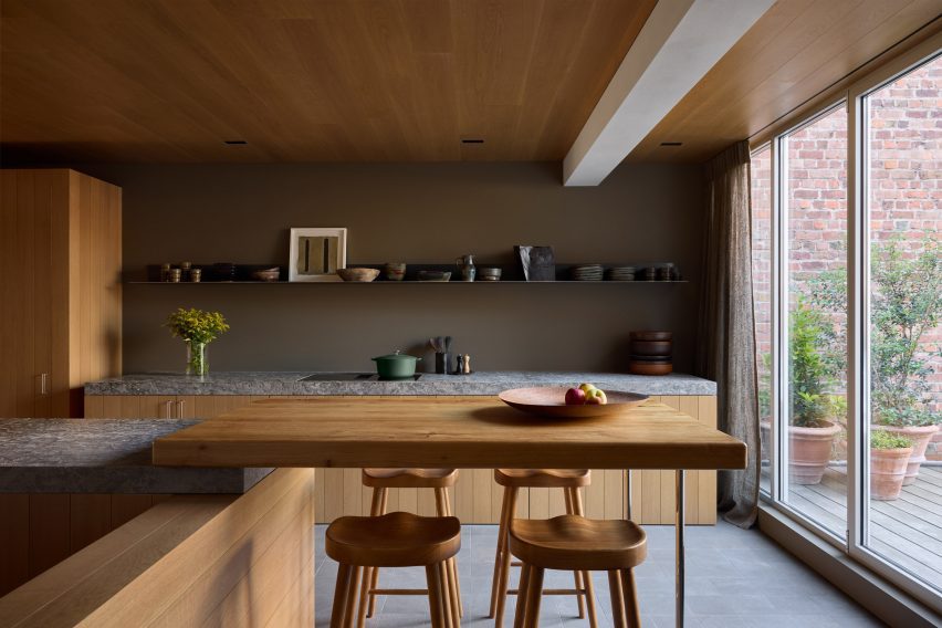 Kitchen with breakfast bar in Townhouse VI in Kortrijk by Decancq Vercruysse