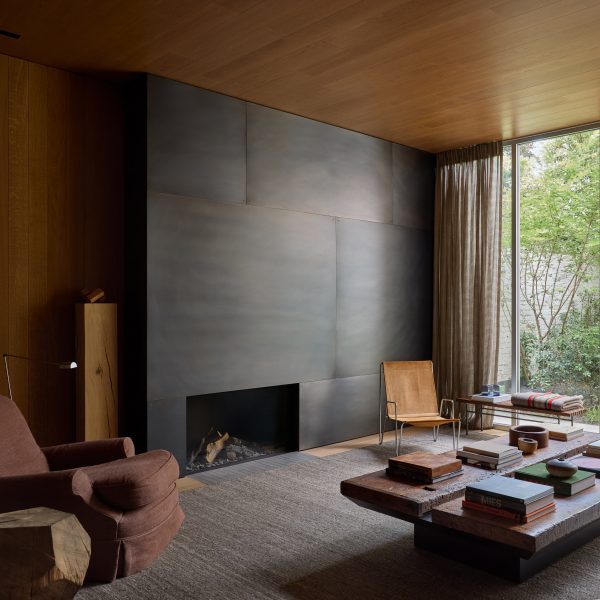 Stainless steel fireplace in Townhouse VI in Kortrijk by Decancq Vercruysse