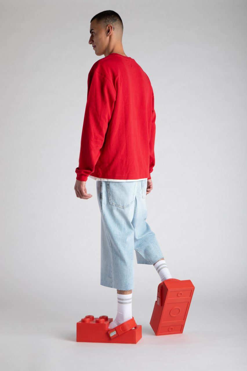 Man wearing Lego shoes
