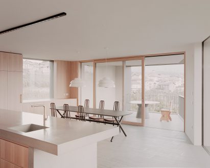 Dining room interior at dwelling by MoDusArchitects