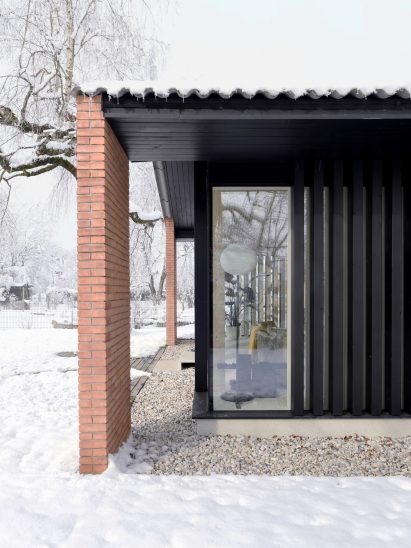 View of extension to House Under the Poplars by OFIS Arhitekti