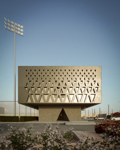Patterned facade of training centre by OODA