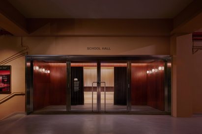 Exterior of school hall with glass doors