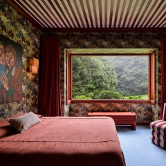 Bedroom with patterned wallpaper