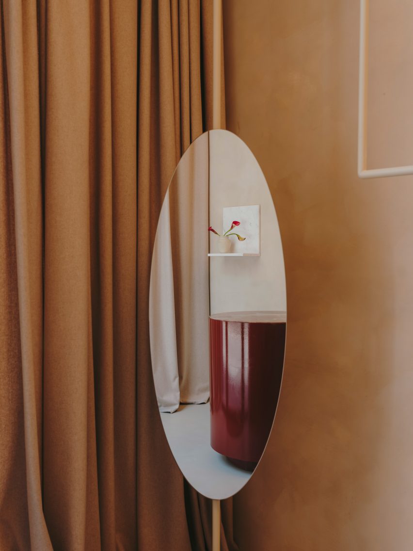 Rounded mirror in reception area