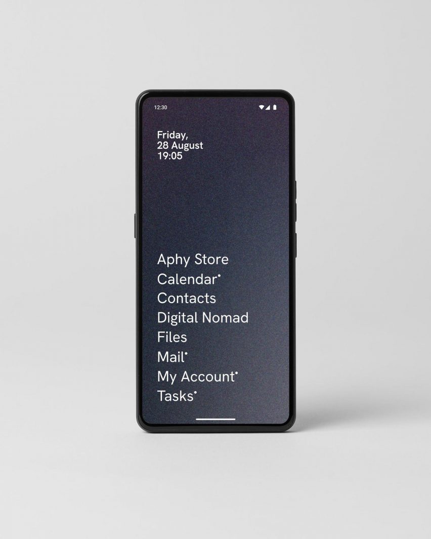 Photo of the Punkt MC03 phone showing a pared-back monochrome interface with just the names of apps in white text on a black background