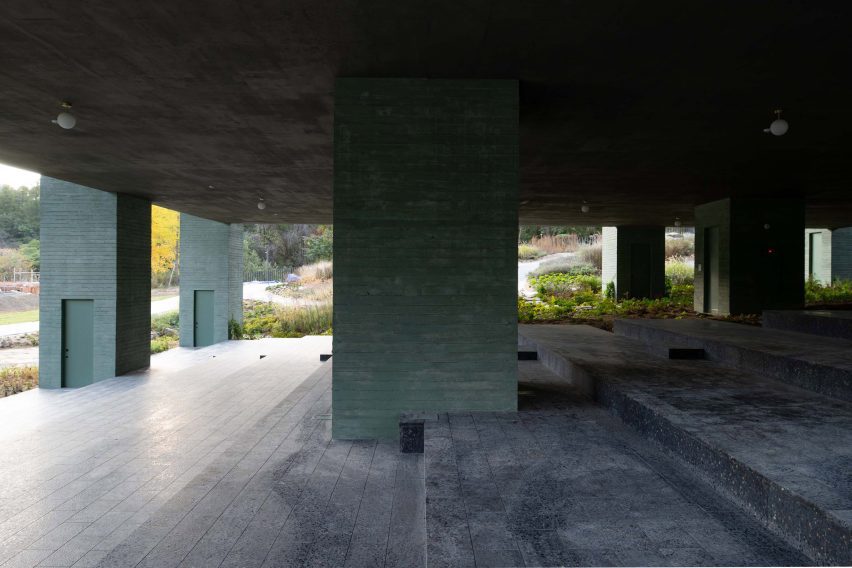Stepped terrace underneath Überhaus restaurant in Les Jardins de Médongaule by Pezo von Ellrichshausen