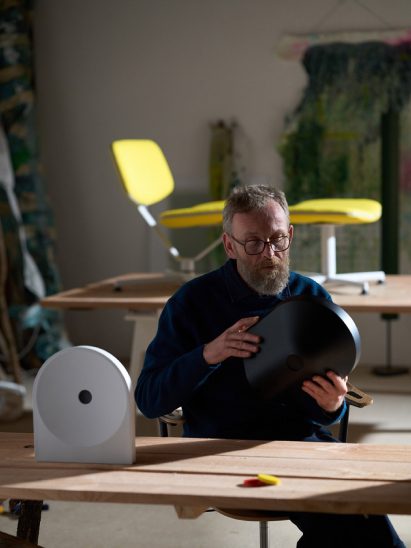 Erwan Bouroullec holding a Samsung speaker